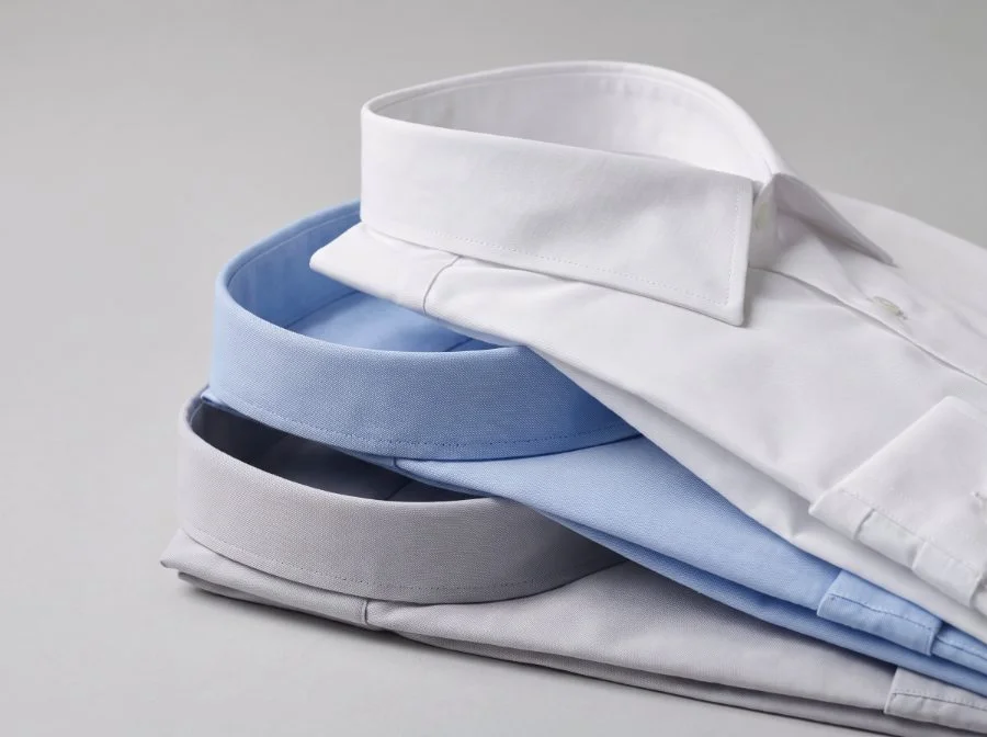 Corporate formal uniform shirts manufactured by Terah Tex — white, light blue and grey poly-cotton with fused collars
