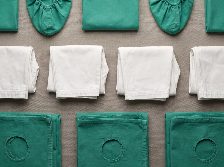 Cloth shoe covers, surgical leggings and fenestrated OT green surgical drapes